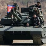 Kim Jong Un Rides Tank with Teenage Daughter Amid Military Drills